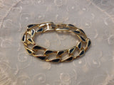 A Magnificent Gold Tone Chain Link Bracelet with Green Enamel