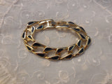 A Magnificent Gold Tone Chain Link Bracelet with Green Enamel